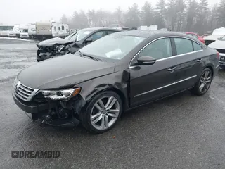 2013 Volkswagen CC Lux with VIN WVWRP7AN5DE554388, listed as a IAAI auction lot 41004116 with 162,457 mi miles. Bid and sale history available at carsss.com. Image 2.