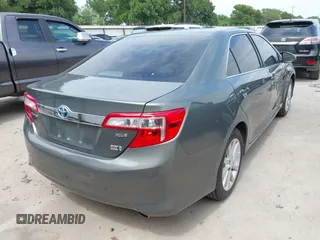 2012 Toyota Camry XLE z VIN 4T1BD1FKXCU034435, wystawiony jako IAAI lot #42024179 z przebiegiem 183 534 mil mil oraz . Historia ofert i sprzedaży dostępna na DreamBid. Obrazek 4.