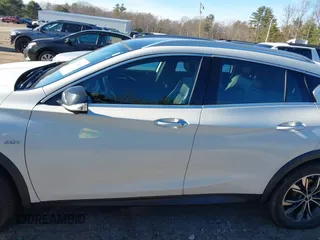 2018 Infiniti QX30 Luxury with VIN SJKCH5CR0JA056820, listed as a IAAI auction lot 40974821 with 71,902 mi miles and . Bid and sale history available at DreamBid. Image 14.