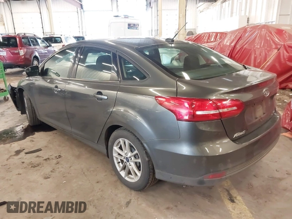 2015 Ford Focus SE with VIN 1FADP3F2XFL201554, listed as a IAAI auction lot 41817418 with 101,938 mi miles. Bid and sale history available at carsss.com. Image 3.