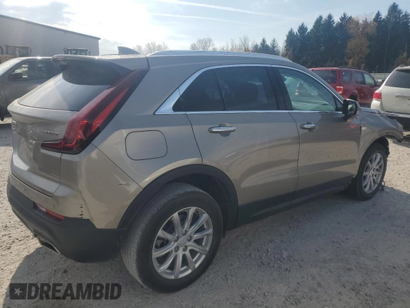 2022 Cadillac XT4 FWD Luxury with VIN 1GYAZAR4XNF121008, listed as a Copart auction lot 77599974 with 29,141 mi miles and Salvage title. Bid and sale history available at DreamBid. Image 3.