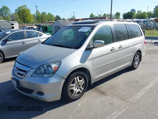 2006 Honda Odyssey EX-L with VIN 5FNRL38736B016026, listed as a IAAI auction lot 41971496 with 302,046 mi miles. Bid and sale history available at carsss.com. Image 2.