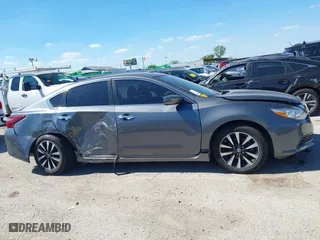 2018 Nissan Altima 2.5 SV with VIN 1N4AL3AP1JC102695, listed as a IAAI auction lot 40440992 with 58,063 mi miles. Bid and sale history available at carsss.com. Image 13.