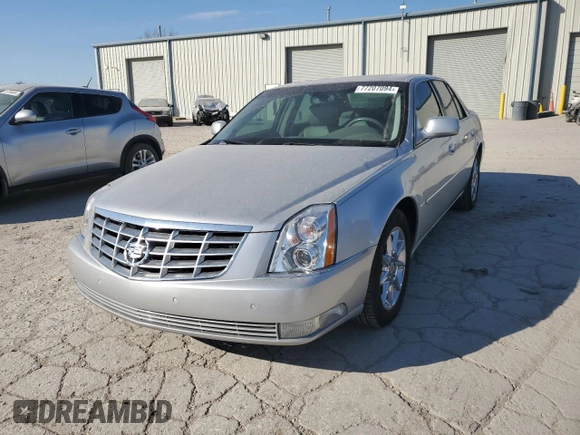 2010 Cadillac DTS w/1SC with VIN 1G6KD5EYXAU126775, listed as a Copart auction lot 77207094 with 100,288 mi miles and Salvage Title. Bid and sale history available at carsss.com. Image 1.