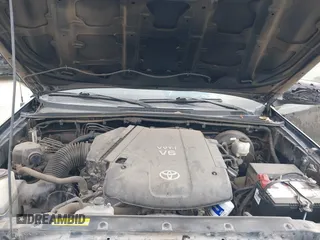 2014 Toyota Tacoma PreRunner with VIN 3TMJU4GN9EM157662, listed as a IAAI auction lot 41952359 with 109,002 mi miles and . Bid and sale history available at DreamBid. Image 10.