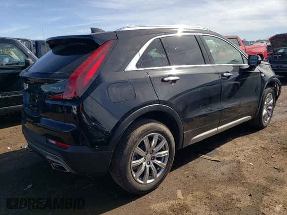 2021 Cadillac XT4 AWD Premium Luxury with VIN 1GYFZDR41MF002835, listed as a Copart auction lot 49384424 with 9,984 mi miles and Salvage Title. Bid and sale history available at carsss.com. Image 3.