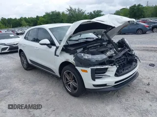 2021 Porsche Macan with VIN WP1AA2A52MLB06086, listed as a IAAI auction lot 39423611 with 56,559 mi miles and . Bid and sale history available at DreamBid. Image 1.