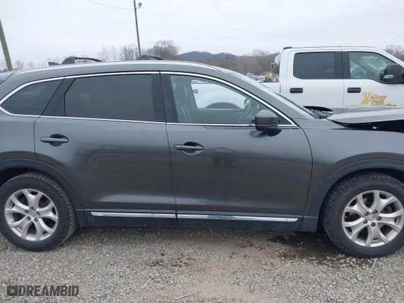 2016 Mazda CX-9 Grand Touring with VIN JM3TCBDY1G0103560, listed as a IAAI auction lot 41344813 with 123,588 mi miles. Bid and sale history available at carsss.com. Image 13.