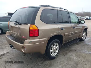 2003 GMC Envoy SLE with VIN 1GKDT13S332264984, listed as a IAAI auction lot 41523191 with 227,004 mi miles. Bid and sale history available at carsss.com. Image 4.