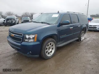 2007 Chevrolet Suburban LTZ with VIN 3GNFK16377G260369, listed as a IAAI auction lot 41124197 with 160,789 mi miles. Bid and sale history available at carsss.com. Image 17.