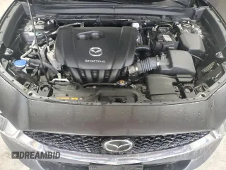 2021 Mazda CX-30 Premium with VIN 3MVDMBDL8MM261593, listed as a Copart auction lot 47950895 with 25,029 mi miles and Salvage Title. Bid and sale history available at carsss.com. Image 12.