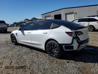 2021 Tesla Model 3 Standard Range Plus z VIN 5YJ3E1EA2MF098140, wystawiony jako Copart lot #73658044 z przebiegiem 118 452 mil mil oraz Szkoda całkowita • Salvage title. Historia ofert i sprzedaży dostępna na DreamBid. Obrazek 2.