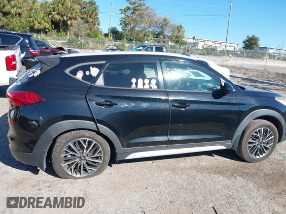 2019 Hyundai Tucson Sport with VIN KM8J33AL5KU902933, listed as a IAAI auction lot 41286316 with 73,799 mi miles. Bid and sale history available at carsss.com. Image 14.