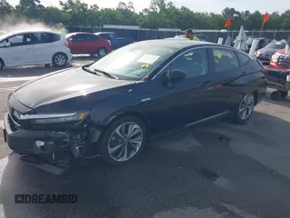 2021 Honda Clarity Touring z VIN JHMZC5F3XMC001253, wystawiony jako IAAI lot #42212102 z przebiegiem 35 649 mil mil oraz . Historia ofert i sprzedaży dostępna na DreamBid. Obrazek 2.
