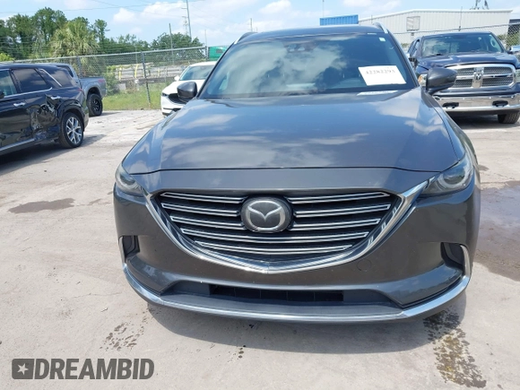 2016 Mazda CX-9 Signature with VIN JM3TCBEY9G0100579, listed as a IAAI auction lot 42282293 with 142,700 mi miles and . Bid and sale history available at DreamBid. Image 12.