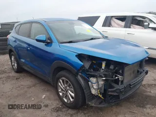 2018 Hyundai Tucson SE with VIN KM8J23A4XJU784615, listed as a IAAI auction lot 41779582 with 59,280 mi miles. Bid and sale history available at carsss.com. Image 1.