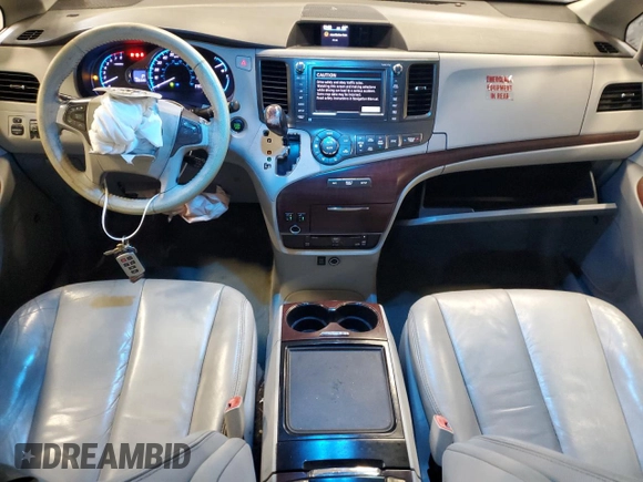 2012 Toyota Sienna XLE with VIN 5TDDK3DC2CS031088, listed as a Copart auction lot 60642845 with 186,586 mi miles and Salvage title. Bid and sale history available at DreamBid. Image 8.