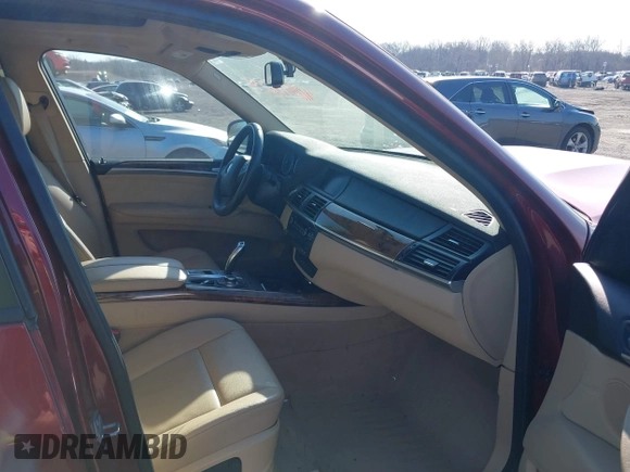 2011 BMW X5 35i with VIN 5UXZV4C52BL413125, listed as a IAAI auction lot 41697824 with 136,828 mi miles. Bid and sale history available at carsss.com. Image 5.
