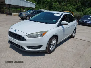 2017 Ford Focus SE with VIN 1FADP3F28HL307889, listed as a IAAI auction lot 42414711 with 169,579 mi miles and . Bid and sale history available at DreamBid. Image 2.