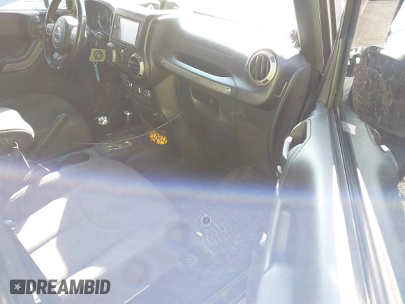 2014 Jeep Wrangler Unlimited Sport with VIN 1C4HJWDG1EL251271, listed as a IAAI auction lot 41647210 with 100,168 mi miles. Bid and sale history available at carsss.com. Image 5.