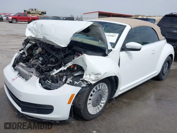 2015 Volkswagen Beetle 1.8T w/Tech with VIN 3VW517AT4FM812294, listed as a IAAI auction lot 41753967 with 59,857 mi miles and . Bid and sale history available at DreamBid. Image 2.