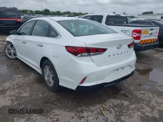 2018 Hyundai Sonata SEL with VIN 5NPE34AF8JH598317, listed as a IAAI auction lot 42214605 with 106,939 mi miles and . Bid and sale history available at carsss.com. Image 3.
