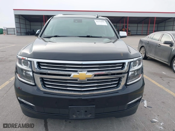 2016 Chevrolet Tahoe LTZ with VIN 1GNSKCKC9GR217166, listed as a IAAI auction lot 41152096 with 133,589 mi miles. Bid and sale history available at carsss.com. Image 12.