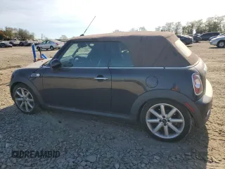 2014 MINI Convertible S with VIN WMWZP3C55ET298172, listed as a Copart auction lot 76977114 with 119,138 mi miles and Salvage title. Bid and sale history available at DreamBid. Image 2.