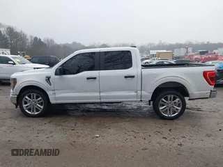 2023 Ford F-150 XL with VIN 1FTEW1C87PFA34231, listed as a IAAI auction lot 41403103 with 29,475 mi miles. Bid and sale history available at carsss.com. Image 14.