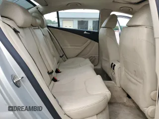 2009 Volkswagen Passat z VIN WVWJK93C49P054575, wystawiony jako Copart lot #57880855 z przebiegiem 148 327 mil mil oraz Szkody całkowita. Historia ofert i sprzedaży dostępna na DreamBid. Obrazek 10.