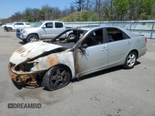 2004 Toyota Camry LE z VIN JTDBE32K740250691, wystawiony jako Copart lot #55793225 z przebiegiem Nie podano mil oraz Szkoda całkowita • Salvage title. Historia ofert i sprzedaży dostępna na DreamBid. Obrazek 1.