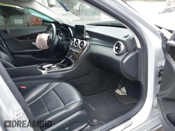 2015 Mercedes-Benz C 300 with VIN 55SWF4JB1FU077386, listed as a IAAI auction lot 42164280 with 104,452 mi miles and . Bid and sale history available at carsss.com. Image 5.