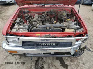 1991 Toyota Pickup DX z VIN JT4RN01P0M7042332, wystawiony jako Copart lot #42408835 z przebiegiem 211 481 mil mil oraz Szkoda całkowita • Salvage title. Historia ofert i sprzedaży dostępna na DreamBid. Obrazek 11.
