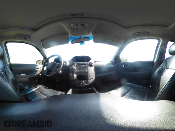 2012 Honda Pilot Touring with VIN 5FNYF4H95CB026191, listed as a IAAI auction lot 42021987 with 229,273 mi miles and . Bid and sale history available at DreamBid. Image 18.