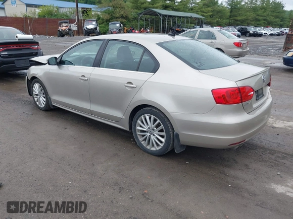 2014 Volkswagen Jetta TDI w/Premium/Nav with VIN 3VWLL7AJ9EM226026, listed as a IAAI auction lot 42219871 with 100,386 mi miles and . Bid and sale history available at DreamBid. Image 3.