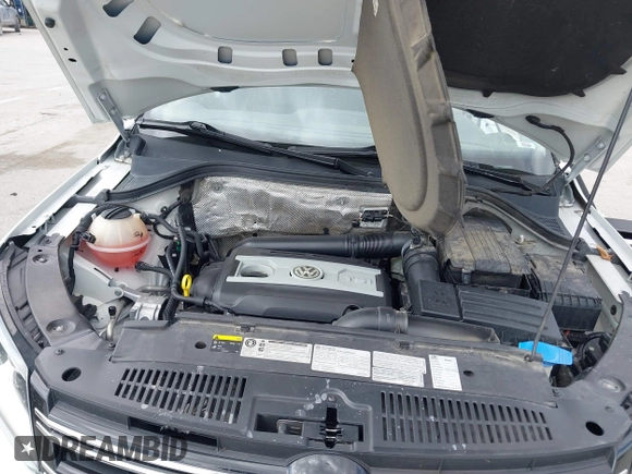 2016 Volkswagen Tiguan S with VIN WVGBV7AX5GW600479, listed as a IAAI auction lot 41828028 with 131,910 mi miles and . Bid and sale history available at DreamBid. Image 10.