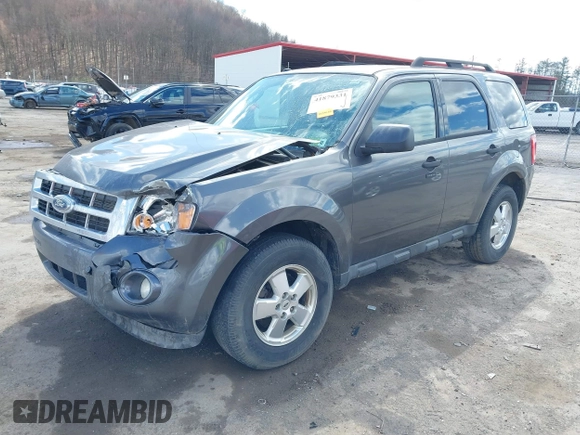 2012 Ford Escape XLT with VIN 1FMCU0D76CKC01916, listed as a IAAI auction lot 41879331 with 194,201 mi miles. Bid and sale history available at carsss.com. Image 2.