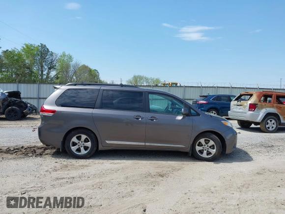 2014 Toyota Sienna LE AAS with VIN 5TDKK3DC4ES431664, listed as a IAAI auction lot 42081429 with 208,505 mi miles and . Bid and sale history available at carsss.com. Image 13.
