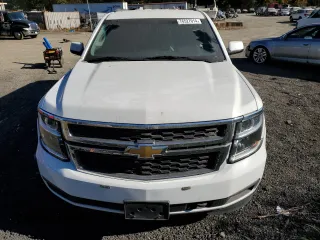 2020 Chevrolet Suburban Commercial with VIN 1GNSKKEC4LR213767, listed as a Copart auction lot 76527014 with 142,132 mi miles and Clean Title. Bid and sale history available at carsss.com. Image 5.