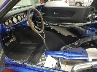 1965 Ford Mustang с VIN 5F09A744938, выставлен на аукционе Copart как лот 64055525 с пробегом Не указан миль и Списание • Salvage title. История ставок и продаж доступна на DreamBid. Изображение 7.
