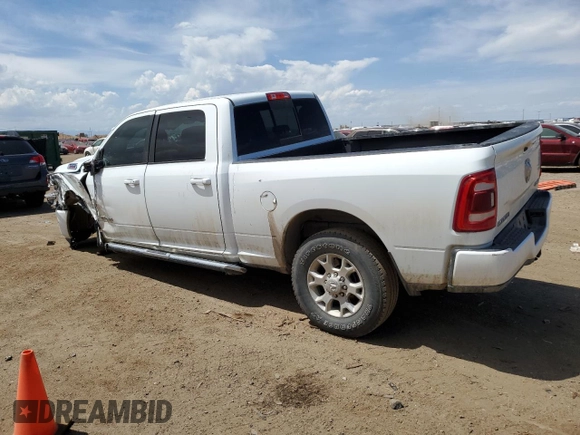2023 Ram 2500 Laramie with VIN 3C6UR5FL9PG632207, listed as a Copart auction lot 56260654 with 31,302 mi miles and Salvage Title. Bid and sale history available at carsss.com. Image 2.