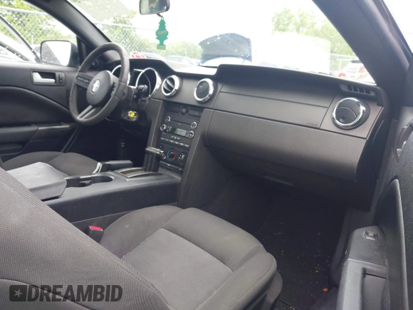 2009 Ford Mustang with VIN 1ZVHT80N795142637, listed as a IAAI auction lot 42595602 with 69,284 mi miles and . Bid and sale history available at DreamBid. Image 5.