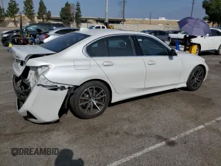 2020 BMW 3 Series 330i with VIN WBA5R1C01LFH42423, listed as a Copart auction lot 54194495 with 50,688 mi miles and Salvage Title. Bid and sale history available at carsss.com. Image 3.