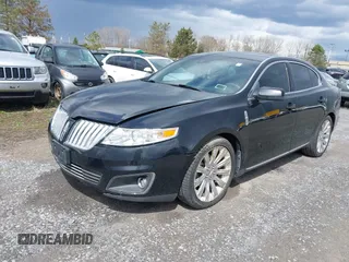 2011 Lincoln MKS EcoBoost with VIN 1LNHL9FTXBG600398, listed as a IAAI auction lot 42047512 with 114,274 mi miles and . Bid and sale history available at DreamBid. Image 2.