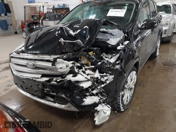 2017 Ford Escape SE with VIN 1FMCU9GD8HUE81307, listed as a IAAI auction lot 41386675 with 133,821 mi miles and . Bid and sale history available at DreamBid. Image 6.