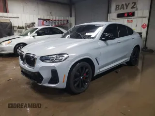 2022 BMW X4 M40i with VIN 5UX43DT03N9L24136, listed as a Copart auction lot 87867785 with 46,262 mi miles and Salvage title. Bid and sale history available at DreamBid. Image 1.