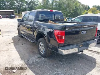 2021 Ford F-150 XL with VIN 1FTFW1E5XMKE21429, listed as a IAAI auction lot 40347406 with 125,000 mi miles. Bid and sale history available at carsss.com. Image 3.