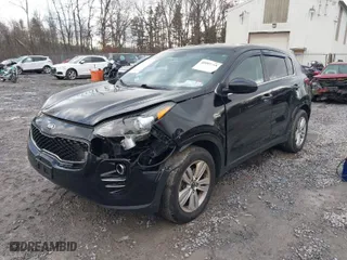 2018 Kia Sportage LX with VIN KNDPMCAC8J7447200, listed as a IAAI auction lot 40901708 with 121,418 mi miles. Bid and sale history available at carsss.com. Image 2.