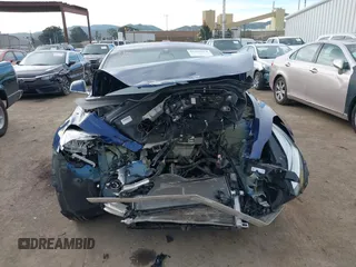 2018 Tesla Model 3 Long Range Battery z VIN 5YJ3E1EA3JF043451, wystawiony jako IAAI lot #41529214 z przebiegiem 65 375 mil mil oraz . Historia ofert i sprzedaży dostępna na DreamBid. Obrazek 13.