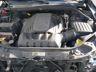 2013 Jeep Grand Cherokee Overland with VIN 1C4RJFCT3DC636378, listed as a IAAI auction lot 41477415 with 147,651 mi miles. Bid and sale history available at carsss.com. Image 10.